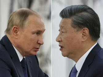 1243250567 (COMBO) This combination of pictures created on September 15, 2022 shows Russian President Vladimir Putin and China's President Xi Jinping during their meeting on the sidelines of the Shanghai Cooperation Organisation (SCO) leaders' summit in Samarkand. (Photo by Alexandr Demyanchuk / SPUTNIK / AFP) (Photo by ALEXANDR DEMYANCHUK/SPUTNIK/AFP via Getty Images)