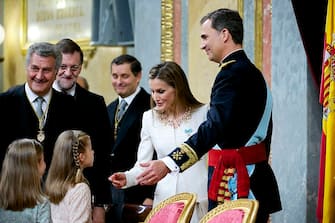 MADRID, SPAIN - JUNE 19:  King Felipe VI of Spain (R) attends along side Queen Letizia of Spain, Princess Leonor, Princess of Asturias and Princess Sofia of Spain during his inauguration at the Parliament (Congreso de los Diputados) on June 19, 2014 in Madrid, Spain. The coronation of King Felipe VI is held in Madrid. His father, the former King Juan Carlos of Spain abdicated on June 2nd after a 39 year reign. The new King is joined by his wife Queen Letizia of Spain.  (Photo by Juan Naharro Gimenez/Getty Images)