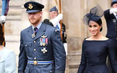 Britain's Meghan, Duchess of Sussex and Britain's Prince Harry, Duke of Sussex leave a service to mark the centenary of the Royal Air Force (RAF) at Westminster Abbey in central London on July 10, 2018. (Photo by Chris J Ratcliffe / AFP)        (Photo credit should read CHRIS J RATCLIFFE/AFP via Getty Images)