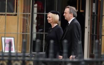 Prime Minister Liz Truss and husband Hugh O'Leary arrive at the State Funeral of Queen Elizabeth II, held at Westminster Abbey, London.Picture date: Monday September 19, 2022.