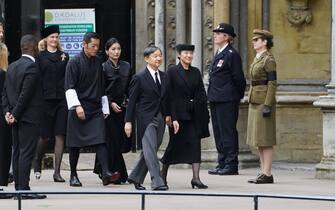 Emperor of Japan Naruhito (centre) and wife Empress Masako arrive at the State Funeral of Queen Elizabeth II, held at Westminster Abbey, London.Picture date: Monday September 19, 2022.