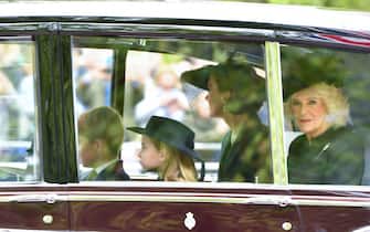 Princess Charlotte, Prince George, the Princess of Wales and the Queen Consort are seen on The Mall, central London arriving for Queen Elizabeth II state funeral on Monday. Picture date: Monday September 19, 2022.