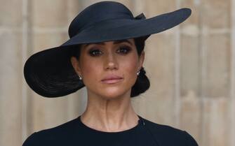 19/09/2022. London, United Kingdom. Meghan Markle, the Duchess of Sussex watches the coffin of Queen Elizabeth II leaving Westminster Abbey in London at the end of the State Funeral Service., Credit:Stephen Lock / i-Images / Avalon