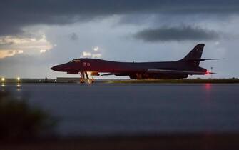 epa06223024 A handout photo made available by the US Air Force shows a US Air Force B-1B Lancer, assigned to the 37th Expeditionary Bomb Squadron, deployed from Ellsworth Air Force Base, South Dakota, prepares to take off from Andersen AFB, Guam, 23 September 2017. According to the US Air Force, its B-1B Lancer bombers from Guam and US Air Force F-15C Eagle fighter escorts from Okinawa, Japan, flew in international airspace over waters east of North Korea.  EPA/SGT. JOSHUA SMOOT/US AIR FORCE HANDOUT  HANDOUT EDITORIAL USE ONLY/NO SALES