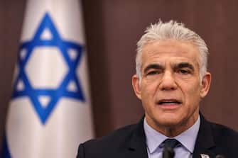 epa10191082 Israel's caretaker Prime Minister Yair Lapid attends the weekly cabinet meeting in Jerusalem, 18 September 2022.  EPA/RONALDO SCHEMIDT / POOL