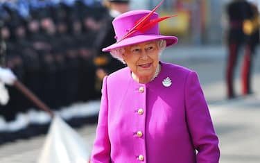 A handout photograph made availalble by the British Ministry of Defence shows Britain's Queen Elizabeth II attending a rededication ceremony for HMS Ocean, the British Royal Navy's amphibious assault ship and landing platform helicopter, after a 65 million GBP refit at the Devonpoart dockyard, Plymouh, south west England, 20 March 2015. The Queen took part in her role as the ships sponsor.  ANSA/BEN SHREAD / HANDOUT MANDATORY CREDIT: CROWN COPYRIGHT HANDOUT EDITORIAL USE ONLY/NO SALES