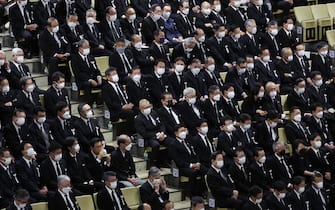 epa10208594 Dignitaries wait for the procession during the state funeral of former Japanese Prime Minister Shinzo Abe at Nippon Budokan in Tokyo, Japan, 27 September 2022. Thousands of people are gathered in Tokyo to attend the state funeral for former prime minister Shinzo Abe, including foreign dignitaries and representatives from more than 200 countries and international organizations.  EPA/TAKASHI AOYAMA / POOL