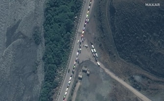 A handout satellite image made available by Maxar Technologies shows traffic jam near Russia's border with Georgia, 25 September 2022 (issued 27 September 2022). Russian President Putin announced in a televised address to the nation on 21 September, that he signed a decree on partial mobilization in the Russian Federation due to the conflict in Ukraine. Georgian Interior Minister Vakhtang Gomelauri said on 27 September, that in recent days some 10,000 Russians have crossed the border with Georgia every day. Thousands of Russian men left Russia since the mobilization was announced.  ANSA/MAXAR TECHNOLOGIES HANDOUT -- MANDATORY CREDIT: SATELLITE IMAGE 2022 MAXAR TECHNOLOGIES -- THE WATERMARK MAY NOT BE REMOVED/CROPPED -- HANDOUT EDITORIAL USE ONLY/NO SALES
