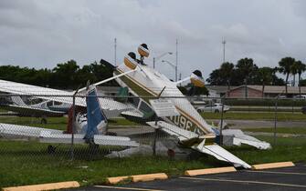 General View (Aftermath of a Tornado at North Perry Airport In Florida As Hurricane Ian Approaches) A general view of the aftermath as Small aircraft are seen flipped up side down after a reported tornado touches down at North Perry Airport as Hurricane Ian approaches
-PICTURED: General View (Aftermath of a Tornado at North Perry Airport In Florida As Hurricane Ian Approaches)
-LOCATION: Pembroke Pines USA
-DATE: 28 Sep 2022
-CREDIT: Robert Bell/INSTARimages.com