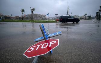 A blown down street sign is seen as the eye of Hurricane Ian passes by in Punta Gorda, Florida on September 28, 2022. - Hurricane Ian slammed into Florida September 28, 2022, with the National Hurricane Center saying the eye of the storm made landfall at 1905 GMT as high winds and heavy rain pounded the coast. (Photo by Ricardo ARDUENGO / AFP) (Photo by RICARDO ARDUENGO/AFP via Getty Images)