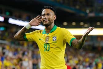 MIAMI, FLORIDA - SEPTEMBER 06: Neymar Jr. # 10 of Brazil reacts after assisting Casemiro # 5 on a goal against Colombia during the first half of the friendly at Hard Rock Stadium on September 06, 2019 in Miami, Florida.  (Photo by Michael Reaves / Getty Images)