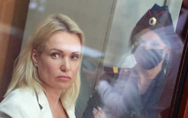 Russian Channel One TV former journalist Marina Ovsyannikova reacts inside a glass cage during a hearing at the Basmanny district court in Moscow, Russia, 11 August 2022. Ovsyannikova was arrested on 10 August 2022. ANSA/MAXIM SHIPENKOV