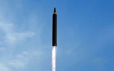 This undated picture released from North Korea's official Korean Central News Agency (KCNA) on September 16, 2017 shows a launching drill of the medium-and-long range strategic ballistic rocket Hwasong-12 at an undisclosed location.
Kim vowed to complete North Korea's nuclear force despite sanctions, saying the final goal of his country's weapons development is "equilibrium of real force" with the United States, state media reported on September 16.  / AFP PHOTO / KCNA VIA KNS / STR / South Korea OUT / REPUBLIC OF KOREA OUT   ---EDITORS NOTE--- RESTRICTED TO EDITORIAL USE - MANDATORY CREDIT "AFP PHOTO/KCNA VIA KNS" - NO MARKETING NO ADVERTISING CAMPAIGNS - DISTRIBUTED AS A SERVICE TO CLIENTS
THIS PICTURE WAS MADE AVAILABLE BY A THIRD PARTY. AFP CAN NOT INDEPENDENTLY VERIFY THE AUTHENTICITY, LOCATION, DATE AND CONTENT OF THIS IMAGE. THIS PHOTO IS DISTRIBUTED EXACTLY AS RECEIVED BY AFP.  /          (Photo credit should read STR/AFP via Getty Images)