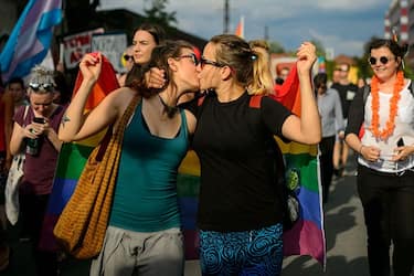 Women kiss as they take part in the Ljubljana Pride Parade in Ljubljana, Slovenia, on June 18, 2016. / AFP / JURE MAKOVEC        (Photo credit should read JURE MAKOVEC/AFP via Getty Images)