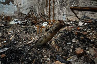 This photograph taken on September 30, 2022 shows the remain of a rocket in a classroom of a destroyed school in Staryi Saltiv, east of Kharkiv, amid the Russian invasion of Ukraine. (Photo by SERGEY BOBOK / AFP) (Photo by SERGEY BOBOK/AFP via Getty Images)
