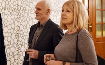 Belarusian human rights activist Ales Bialiatski (Beliatsky) and his wife Natalia Pinchuk attend a reception after he received the Franco-German Prize for Human Rights and the Rule of Law in Minsk, on December 11, 2019. (Photo by Sergei GAPON / AFP) (Photo by SERGEI GAPON/AFP via Getty Images)