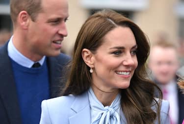CARRICKFERGUS, NORTHERN IRELAND - OCTOBER 06: Prince William, Prince of Wales and Catherine, Princess of Wales during a visit to Carrickfergus on October 06, 2022 in Northern Ireland. (Photo by Karwai Tang/WireImage)