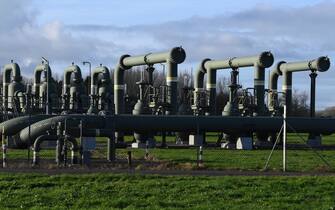 This picture, taken on November 23, 2021, shows pipes belonging to a gas extraction facility near Garelsweerd, in the Northern Dutch province of Groningen, where an earthquake measuring 3.2 on the Richter scale happened two weeks before. - Despite the Dutch government's promise to halt all gas extractions by next year, earthquakes are expected to continue to plague the region for at least the next decade, experts say. (Photo by JOHN THYS / AFP) (Photo by JOHN THYS/AFP via Getty Images)