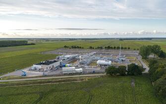 Aerial view of a gas extraction and treatment station, operated by Nederlandse Aardolie Maatschappij BV (NAM), in Slochteren, Netherlands, on Wednesday, Sept. 14, 2022. The Groningen gas field has enough untapped capacity to replace much of the fuel Germany once imported from Russia, but drilling has led to repeated earthquakes, and Dutch officials are loath to risk a backlash from residents by breaking promises. Photographer: Imke Lass/Bloomberg