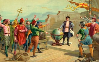 Vintage illustration of Christopher Columbus on the deck of the Santa Maria in 1492; chromolithograph, 1904. (Photo by GraphicaArtis/Getty Images)