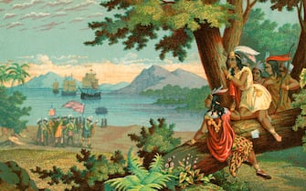 Vintage illustration of Christopher Columbus arriving in the New World; chromolithograph, 1900. (Photo by GraphicaArtis/Getty Images)