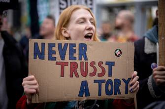 BRITAIN CONSERVATIVE PARTY CONFERENCE epa10219919 People protest outside Conservative Party Conference in Birmingham, Britain, 02 October 2022. Prime Minister Liz Truss admitted they were flaws with the announcement of her 'mini-budget' which led to market turmoils and British pound going historic low against the US dollar. EPA/TOLGA AKMEN