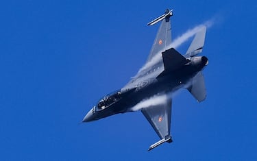A Belgian F-16 jet fighter takes part in the NATO Air Nuclear drill "Steadfast Noon" (its regular nuclear deterrence exercise) at the Kleine-Brogel air base in Belgium on October 18, 2022. - NATO on October 17, 2022 launched its regular nuclear deterrence drills in western Europe, after tensions soared with Russia over President Vladimir Putin's veiled threats in the face of setbacks in Ukraine. The 30-nation alliance has stressed that the "routine, recurring training activity" -- which runs until October 30 -- was planned before Moscow invaded Ukraine and is not linked to the current situation. (Photo by Kenzo TRIBOUILLARD / AFP) (Photo by KENZO TRIBOUILLARD/AFP via Getty Images)