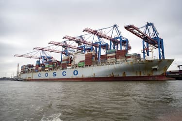A China Ocean Shipping Group Co. (COSCO) container ship at the Port of Hamburg, in Hamburg, Germany, on Tuesday, Oct. 19, 2021. The expectation among businesses in Hamburg is that the next government will be tougher on China when it comes to issues such as market access and intellectual property, as well as on social and environmental compliance, said Doris Hillger, head of the foreign trade department at Hamburg Chamber of Commerce. Photographer: Imke Lass/Bloomberg via Getty Images