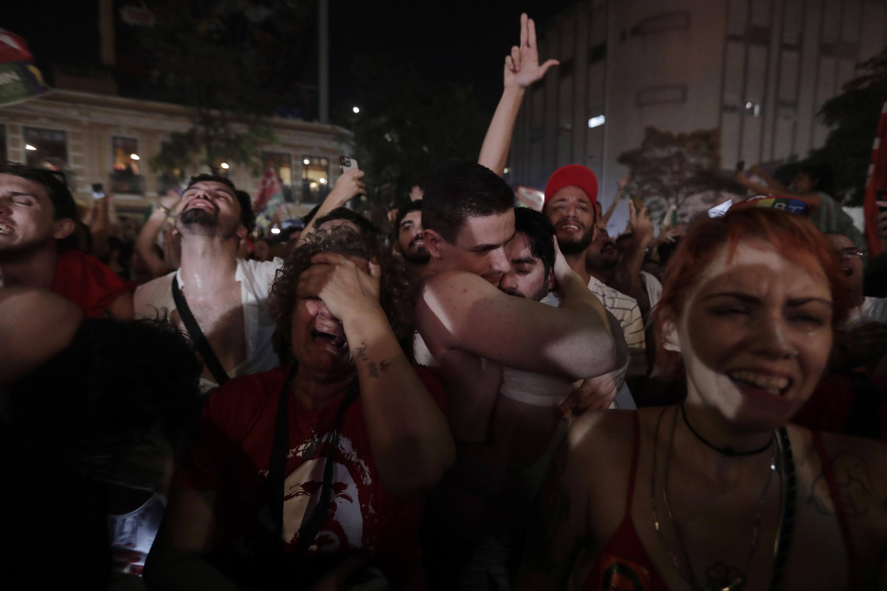 BRAZIL ELECTION epa10276242 Supporters of the Brazilian presidential candidate Luiz Inacio Lula da Silva celebrate the results of the second round of presidential elections, in Rio de Janeiro, Brazil, 30 October 2022. EPA/Antonio Lacerda
