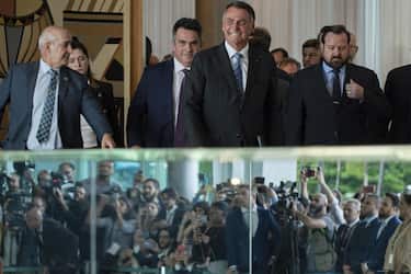 epa10279804 Out-going Brasilian president Jair Bolsonaro arrives to address the media about the results of the Presidential elections, Brasilia, Brazil, 01 November 2022. Bolsonaro, assured that he  will continue to be faithful to the constitution .  EPA/Joedson Alves