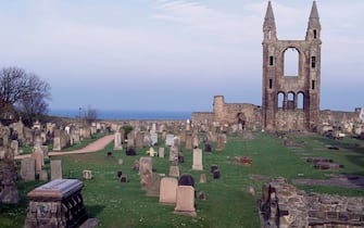 UNITED KINGDOM - MAY 30: View of the ruins of St Andrews Cathedral with the tower of St Rule, Fife.  Scotland, 12th-15th century.  (Photo by DeAgostini / Getty Images)