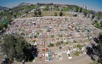 Aerial picture of the General Cemetery of Santiago, in Chile, taken on October 13, 2014. Established in 1821, the more than 85-hectare cemetery is now one of the largest in Latin America with an estimated 2 million burials.  One of the most visited memorials of the cemetery is that of former President Salvador Allende, who died during the 1973 coup d'Ã © tat.  AFP PHOTO / MARTIN BERNETTI / AFP PHOTO / MARTIN BERNETTI (Photo credit should read MARTIN BERNETTI / AFP via Getty Images)