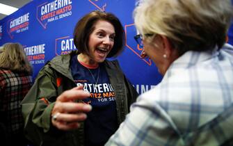 epa10292900 Democratic Senator from Nevada Catherine Cortez Masto (L) greets an attendee during a canvass kickoff event in Henderson, Nevada, USA, 07 November 2022. The US midterm elections are held every four years at the midpoint of each presidential term and this year include elections for all 435 seats in the House of Representatives, 35 of the 100 seats in the Senate and 36 of the 50 state governors as well as numerous other local seats and ballot issues.  EPA/CAROLINE BREHMAN