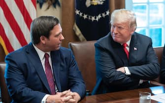 December 12, 2018 - Washington, DC, United States: United States President Donald J. Trump listens to Governor- elect Ron DeSantis of Florida speak during a meeting with governors-elect at the White House. (Photo by Chris Kleponis/Pool/Sipa USA)