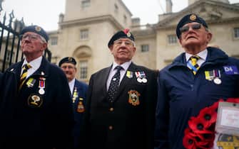 Nuclear test veterans wearing the 'missing medal' as they prepare to march along Whitehall for the Remembrance Sunday service at the Cenotaph in London. Picture date: Sunday November 13, 2022.