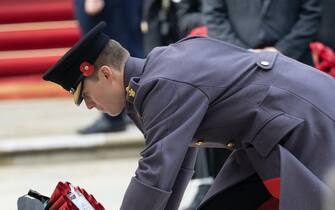 13/11/2022. London, United Kingdom. An equerry  lays a wreath for Camilla, Queen Consort at the Remembrance Sunday service at The Cenotaph in London., Credit:Stephen Lock / Avalon