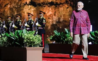 epa10306829 India's Prime Minister Narendra Modi walks to attend a welcoming dinner of the G20 Leaders' Summit at the Garuda Wisnu Kencana Cultural Park in Bali, Indonesia, 15 November 2022. The 17th Group of Twenty (G20) Heads of State and Government Summit runs from 15 to 16 November 2022.  EPA/WILLY KURNIAWAN / POOL