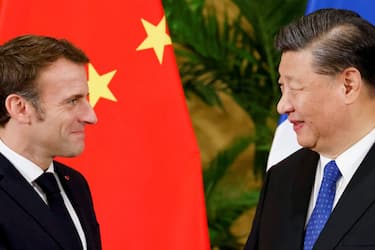 French President Emmanuel Macron (L) meets with Chinese President Xi Jinping on the sidelines of the G20 Summit in Nusa Dua on the Indonesian resort island of Bali on November 15, 2022. (Photo by Ludovic MARIN / POOL / AFP) (Photo by LUDOVIC MARIN/POOL/AFP via Getty Images)