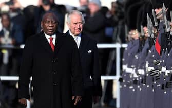 epa10320295 South African President Cyril Ramaphosa (L) with Britain's King Charles III (R) during a welcoming ceremony at Horse Guards Parade in London, Britain, 22 November 2022. South African President Ramaphosa is on a two day state visit to Britain.  EPA/ANDY RAIN