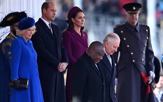 epa10320432 South African President Cyril Ramaphosa (L) with Britain's King Charles III (R) during a welcoming ceremony at Horse Guards Parade in London, Britain, 22 November 2022. South African President Ramaphosa is on a two day state visit to Britain.  EPA/ANDY RAIN