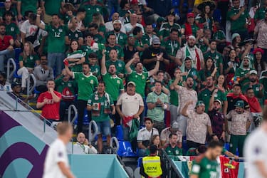 DOHA, QATAR - NOVEMBER 22:  Mexican fans cheer during the 2022 FIFA World Cup group C match between Mexico and Argentina on November 22, 2022, at Stadium 974 in Doha, Qatar. (Photo by Richard Gordon/Icon Sportswire via Getty Images)