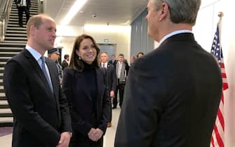 epa10339934 Britain's William, Prince of Wales (L) and his wife Catherine, Princess of Wales (C) are greeted by Massachusetts Governor Charlie Baker (R) at Logan International Airport, in Boston, Massachusetts, November 30, 2022. The Prince and Princess of Wales arrived to attend the Earthshot Prize Awards Ceremony, according to the Royal Household.  EPA/John Tlumacki/The Boston Globe