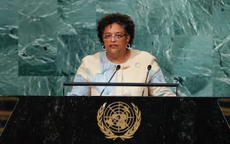epa10199685 Mia Amor Mottley, Prime Minister, Minister for National Security and the Public Service, and Minister for Finance, Economic Affairs and Investment of Barbados, delivers her address during the 77th General Debate inside the General Assembly Hall at United Nations Headquarters in New York, New York, USA, 22 September 2022.  EPA/JASON SZENES