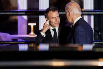 epa10340507 US President Joe Biden and French President Emmanuel Macron depart after dining at the restaurant Fiola Mare, in Washington, DC, USA, 30 November 2022. Biden will welcome French President Macron for the first White House state dinner in more than three years on 01 December setting aside recent tensions with Paris over defense and trade issues to celebrate the oldest US alliance.  EPA/Ting Shen / POOL