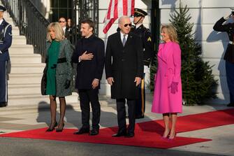 epa10341416 United States President Joe Biden and first lady Dr. Jill Biden host a State Arrival ceremony honoring French President Emmanuel Macron and French First Lady Brigitte Macron on the South Lawn of the White House in Washington, DC, USA, 01 December 2022.  EPA/CHRIS KLEPONIS / POOL