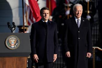 epa10341459 US President Joe Biden welcomes French President Emmanuel Macron to the White House for the first state visit of the Biden administration, on the South Lawn of the White House in Washington, DC, USA, 01 December 2022. EPA/SHAWN THEW