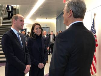 Britain's Prince William, Prince of Wales, and Catherine, Princess of Wales, are welcomed by  Massachusetts Governor Charlie Baker on their arrival to Boston Logan International Airport on November 30, 2022. (Photo by John Tlumacki / POOL / AFP) (Photo by JOHN TLUMACKI/POOL/AFP via Getty Images)