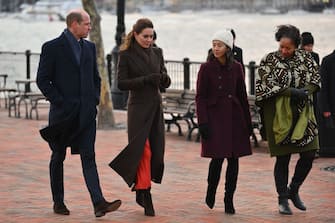 Prince William, Prince of Wales and Catherine, Princess of Wales speak with Mayor Michelle Wu and Reverend Mariama White-Hammond as they visit Piers Park in Boston, Massachusetts, on December 1, 2022. (Photo by ANGELA WEISS / AFP) (Photo by ANGELA WEISS/AFP via Getty Images)