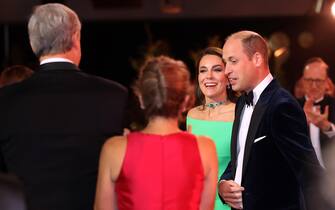 epa10345519 Britain's William, Prince of Wales (R) and Catherine, Princess of Wales (2-R) are greeted by Massachusetts Governor Charlie Baker and his wife Lauren at the Earthshot Prize Awards ceremony at the MGM Music Hall, in Boston, Massachusetts, USA, 02 December 2022.  EPA/DAVID L. RYAN / POOL