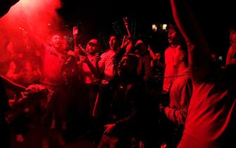 Morocco's supporters celebrate their victory after the Qatar 2022 World Cup football match between Morocco and Spain in Barcelona on December 6, 2022. (Photo by Pau BARRENA / AFP) (Photo by PAU BARRENA/AFP via Getty Images)